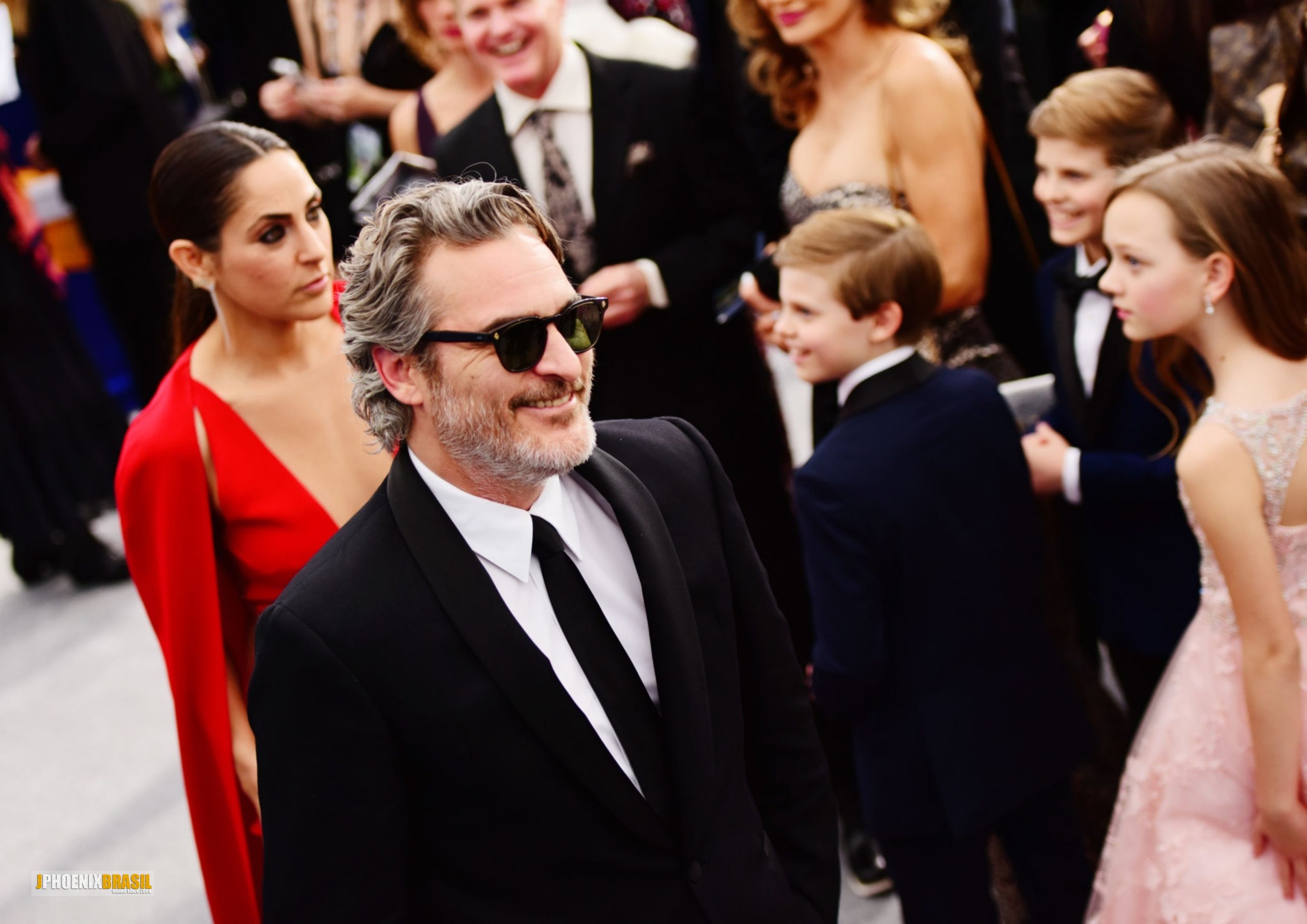 Em louvor às roupas de assinatura de Joaquin Phoenix